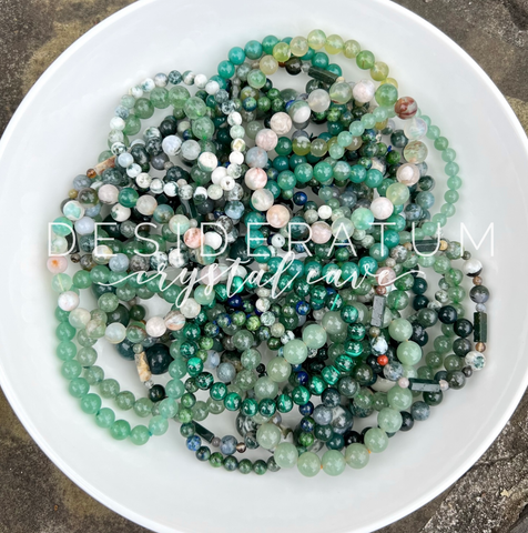 Bowl of Green Colored Genuine Crystal Bracelets